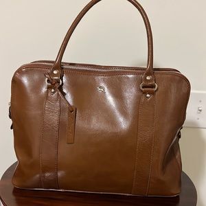 Medium brown oiled leather tote.
